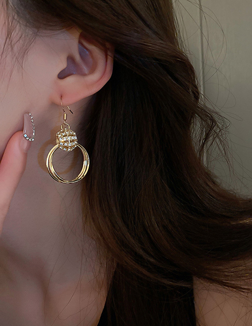 Fashion Gold Alloy Diamond Cutout Round Stud Earrings