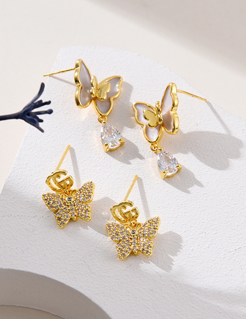 Fashion Golden 1 Zirconia Shell Butterfly Earrings In Copper